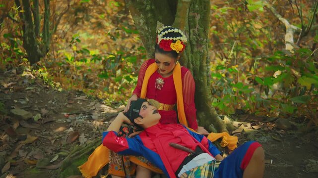 Romantic Javanese Folklore Scene Male Resting on Lap