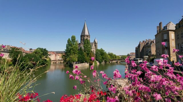 Scenic view of the protestant church Temple Neuf on the Moselle river in Metz, France
