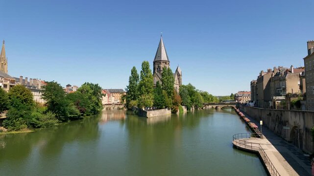 Beautiful panoramic view of the Temple Neuf protestant church on the Moselle river in Metz, France