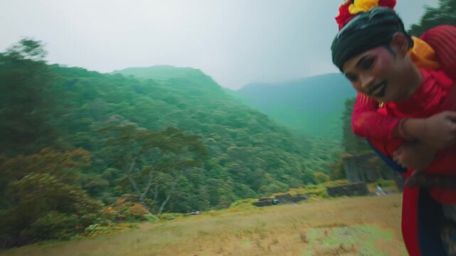 Side View of Man Running While Carrying Woman in Traditional Attire