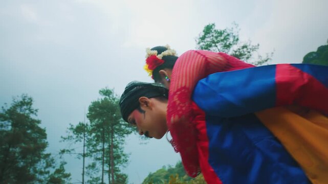 Low Angle of Couple Playing Piggyback Under Cloudy Sky