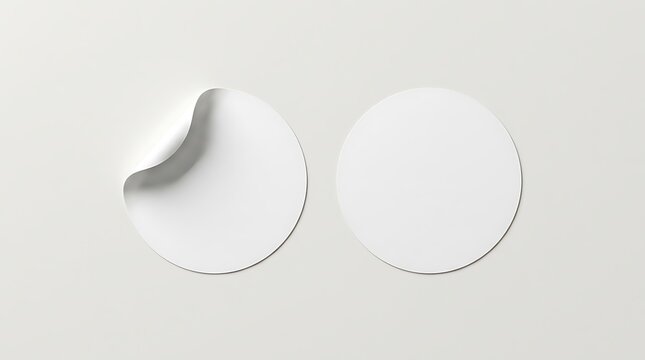 Round white sticker labels with one peeled corner on a light background adhesive template minimalist presentation stationery corporate isolated vertical horizontal backdrop branding