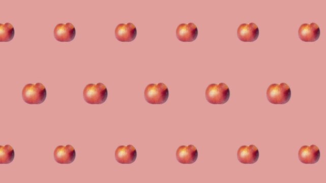 Juicy peach icons pulse in a breathing brick pattern across a pink surface, creating a playful animated motion loop.

