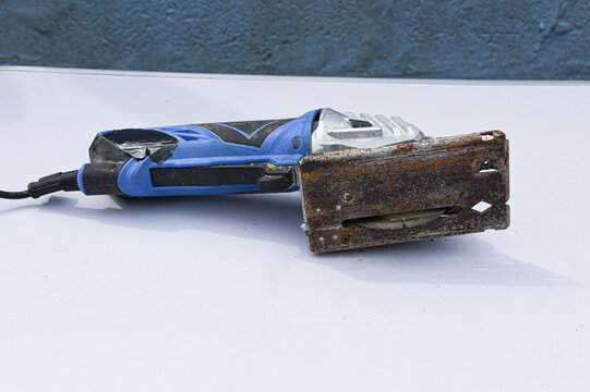 Close-up footage of a handheld circular saw cutting 