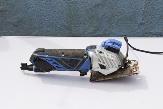 Close-up footage of a handheld circular saw cutting 