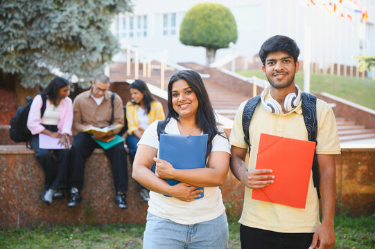 Indian students smiling on university campus