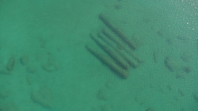 ARCHEOLOGIA SUBACQUEA AEREA, LE CINQUE COLONNE ROMANE DI TORRE CHIANCA A PORTO CESAREO