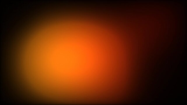 Fiery amber and warm orange gradient light leak drifting on dark abstract background