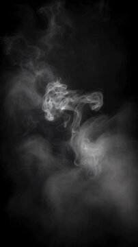 Abstract white smoke swirling on black background creating mysterious and ethereal patterns