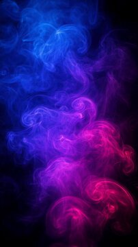 Abstract colorful smoke swirls with vibrant blue and pink tones on black background for creative design