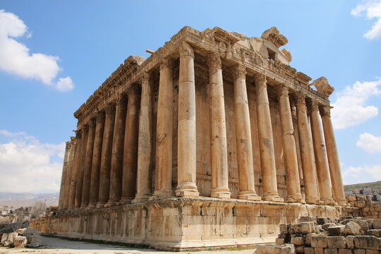 Monumental Roman columns of the ancient Temple of Bacchus at Baalbek, Lebanon, showcasing the impressive architecture of this historic archaeological site.