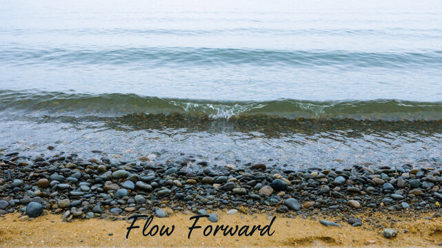 Flow Forward - Peaceful beach scene with gentle waves on pebbles and sand, inspirational quote