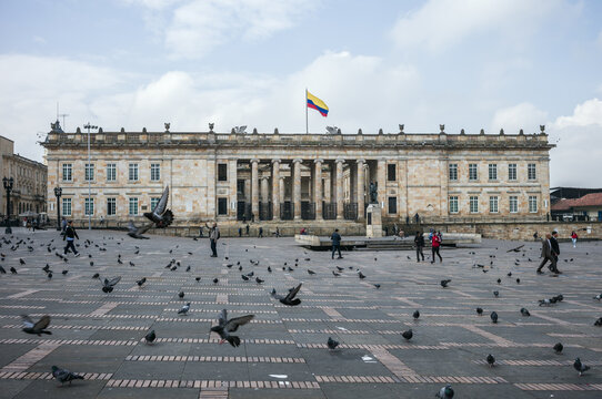 The National Capitol and Colombian flag on Plaza Bolivar, Bogota, Colombia