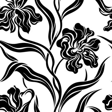 Seamless pattern with stylized iris flowers and curving foliage in bold black and white ink style for fabric and wallpaper