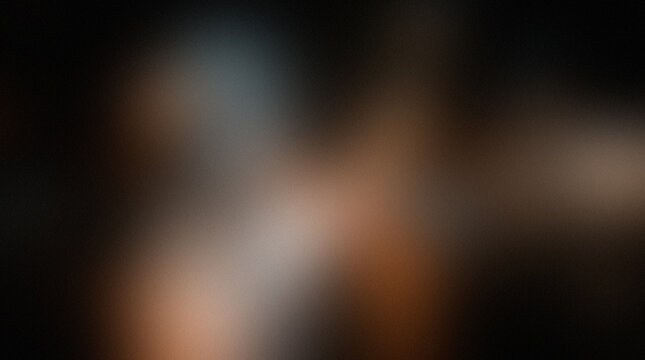 Abstract blurred background with warm and cool color tones creating a dynamic effect