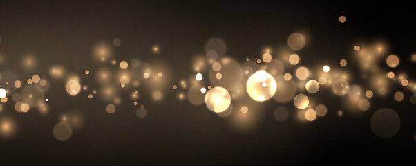 Golden dust forms a luminous cloud of sparkling particles. Soft bokeh and tiny stars create magical festive depth. Ideal for premium design projects. © Freesstock