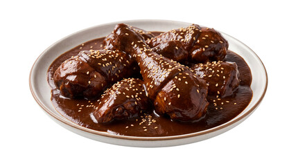 Fototapeta premium Traditional Mexican chicken mole with sesame seeds. Savory dark chocolate sauce on poultry. Authentic mole poblano dish on white plate.