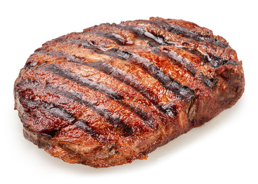 Grilled beef ribeye steak with grill marks isolated on a white background. Clipping Path.