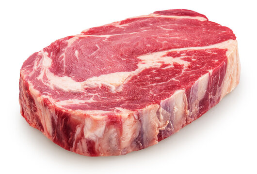 Raw beef ribeye steak meat isolated on a white background.