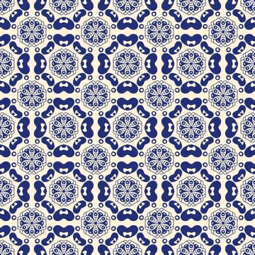 Seamless bold pattern combining navy blue floral mandala medallions with organic bean-shaped motifs on a cream background. Great for textile, modern home decor, and packaging design.