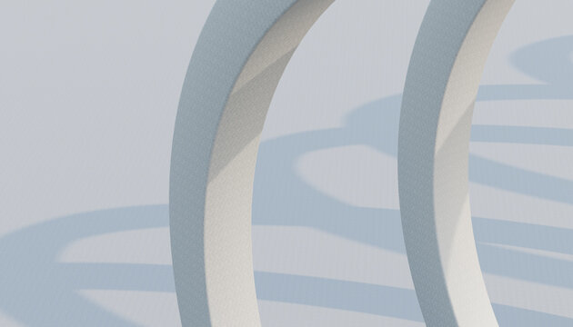 Abstract white curved arches casting soft shadows in minimalist design