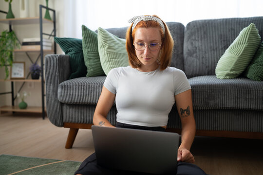 Young white woman working on laptop