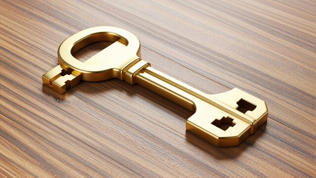 Golden antique key on a wooden surface
