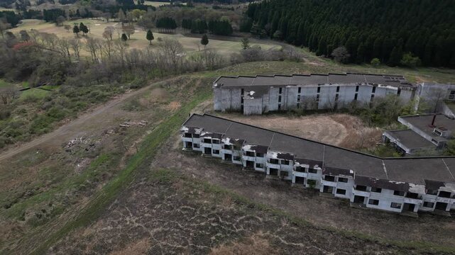 Aerial Drone View of Abandoned Himiko no Sato Resort Hotel in the Aso Grasslands, Kumamoto Japan