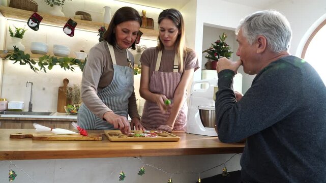The family&mdash;parents and daughter&mdash;did activities together, decorating gingerbread cookies with cream cheese and preparing food for a Thanksgiving and Christmas party at home.

