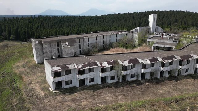 Aerial Drone View of Abandoned Himiko no Sato Resort Hotel in the Aso Grasslands, Kumamoto Japan