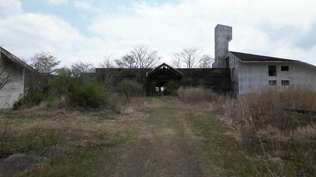 Aerial Drone View of Abandoned Himiko no Sato Resort Hotel in the Aso Grasslands, Kumamoto Japan