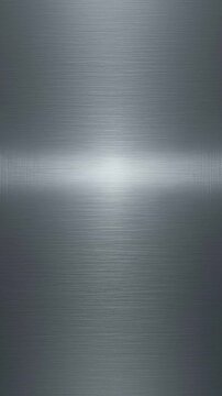 Clean minimal brushed stainless steel metallic surface with soft gradient highlights showing fine horizontal brush lines and a gradual light-to-dark transition