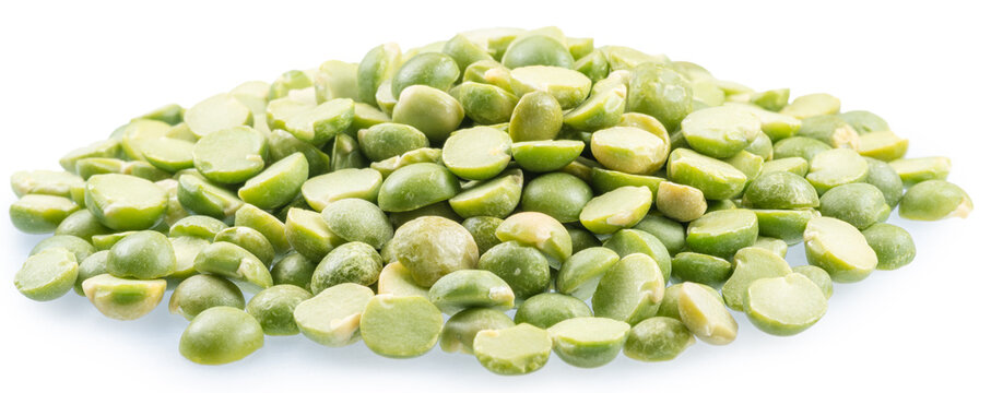 Pile of split peas or halves of green dry peas isolated on white background. File contains clipping paths.