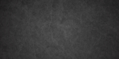 Fototapeta premium Dark charcoal grunge wall texture background. Dark black rough grunge surface with smoke edge. Black texture chalk board and black board.