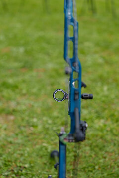 Green bow archery scope crosshair macro detail shot 1.