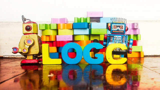 LOGIC with wooden letters and retro bots 