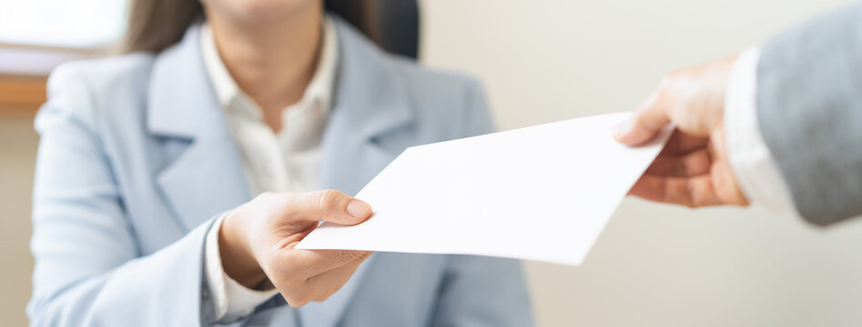 Good job, asian manager business giving financial reward in an envelope, business letter extra salary to company employee, woman worker office hand received premium bonus, getting cheque from her boss