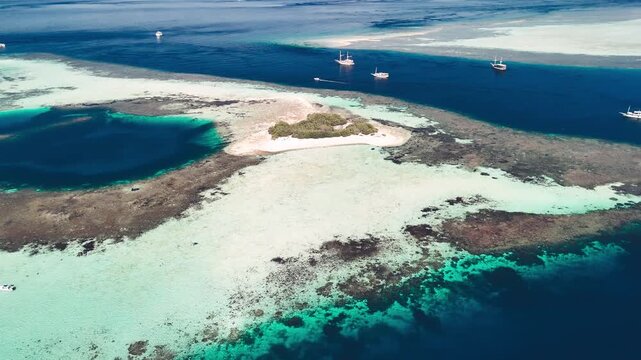 Wide drone panorama of Pulau Karangan and pristine marine