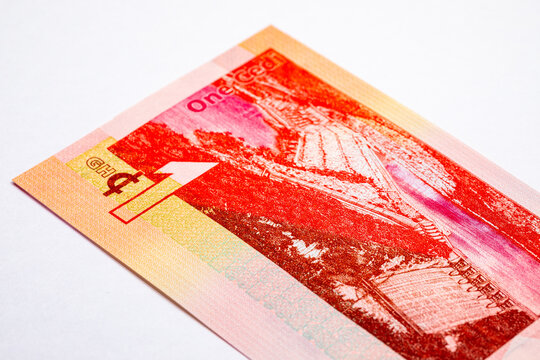 1 Ghanaian Cedi banknote featuring Akosombo Dam on the Volta River, official currency of the Republic of Ghana. African currency.