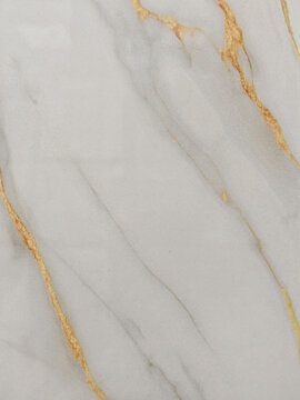 commercial backdrop featuring luxury white marble with elegant gold and amber veins. Modern stone pattern designed for interior design mockups, architectural backdrops, luxury product packaging