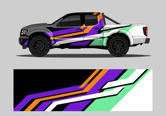 Fototapeta premium Colorful pickup truck with geometric decal design wrap