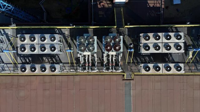 Close-Up Aerial View of AI Data Centre Rooftop HVAC Cooling Fans and Server Chillers