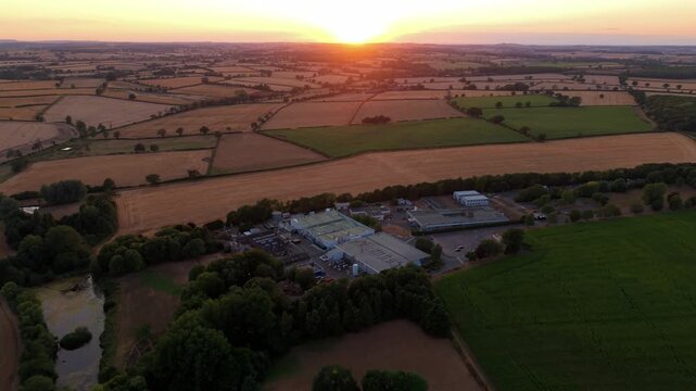 Aerial view of a rural science and technology park at golden sunset in Northamptonshire UK