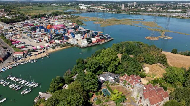 High Angle Aerial View of Coastal Shipping Container Terminal and Commercial Harbour in Eling UK