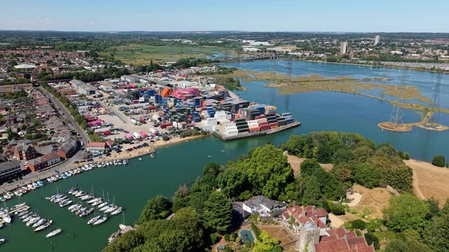 High Angle Aerial View of Coastal Shipping Container Terminal and Commercial Harbour in Eling UK