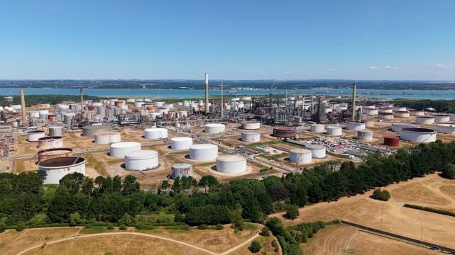 High Angle Aerial Perspective of Industrial Petrochemical Refinery and Fuel Depot Infrastructure on south coast of the UK