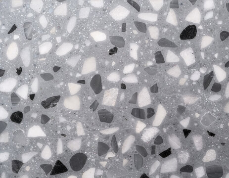 Gray terrazzo texture background template with stone aggregate pattern