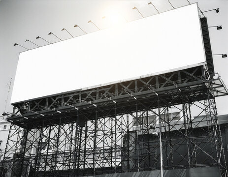 Large blank billboard mockup template on outdoor metal structure