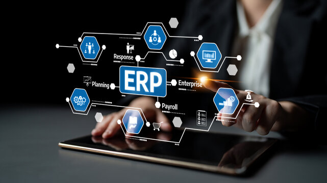 A professional environment showcasing ERP technology through a tablet interface, emphasizing management systems, analytics, and business processes in action. Tessel