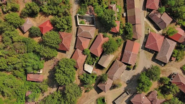 Aerial top view of old rustic vintage houses with wine cellars in Rogljevacke pivnice in Negotin region of Serbia, 4k